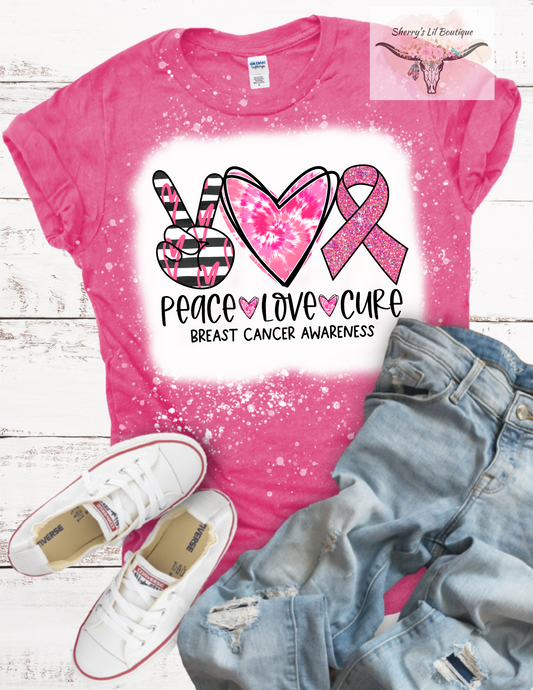 pink tee with peace love cure cancer graphic